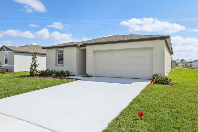 view of front facade with a front lawn, an attached garage, concrete driveway, and stucco siding