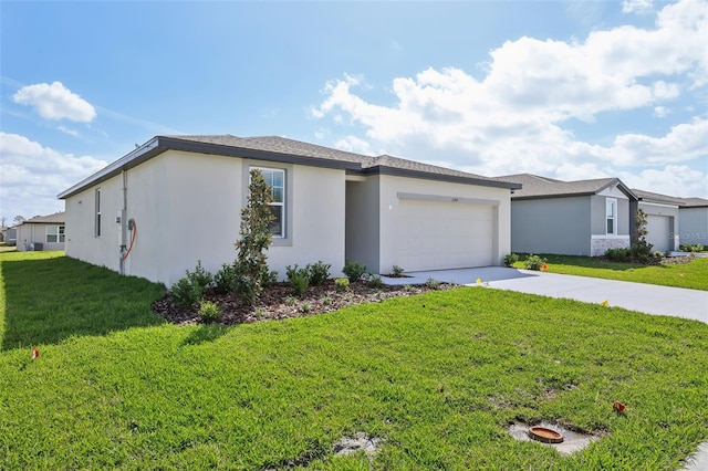 view of front of house featuring stucco siding, concrete driveway, a front lawn, and a garage