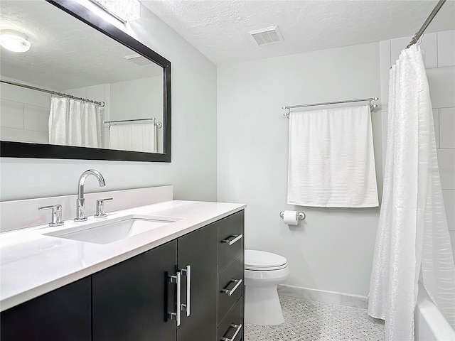 full bathroom with shower / bath combo, a textured ceiling, vanity, and toilet