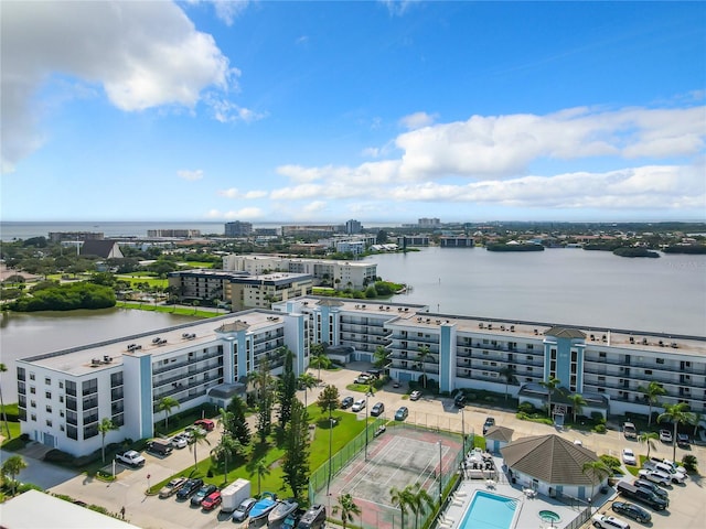 birds eye view of property with a water view