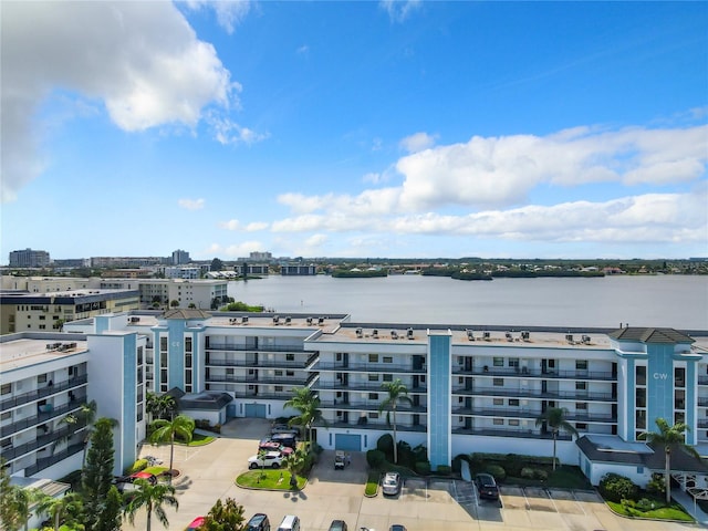 birds eye view of property featuring a water view