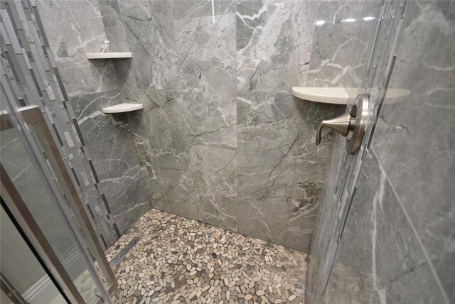 bathroom featuring walk in shower