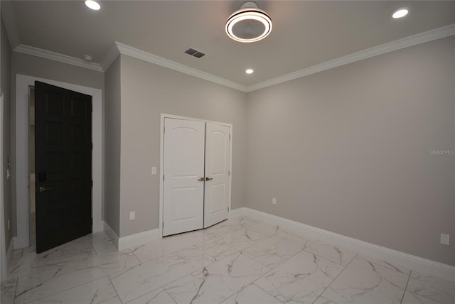 unfurnished bedroom with crown molding