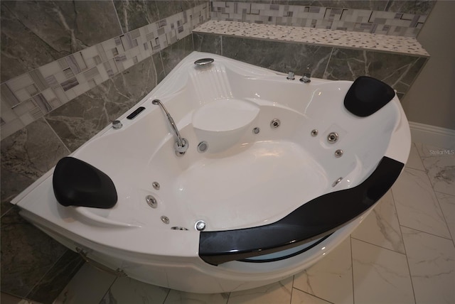 bathroom with a tub