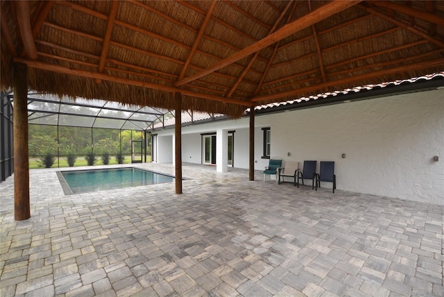 view of pool featuring a lanai, a gazebo, and a patio area