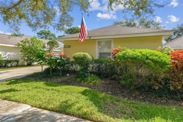 view of home's exterior featuring a lawn