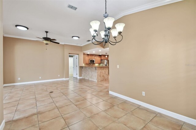 tiled spare room with ceiling fan with notable chandelier and crown molding