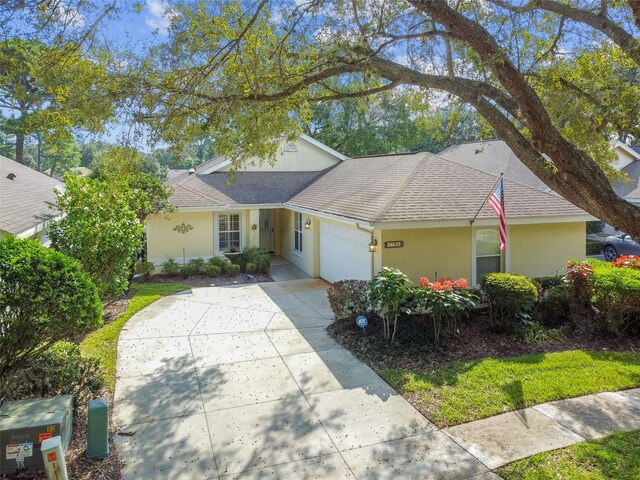 single story home with a garage