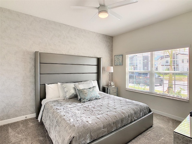 bedroom featuring ceiling fan and carpet flooring