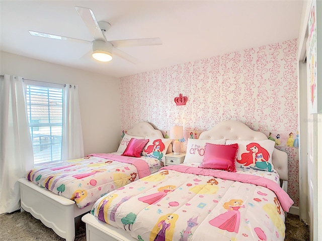 carpeted bedroom featuring ceiling fan