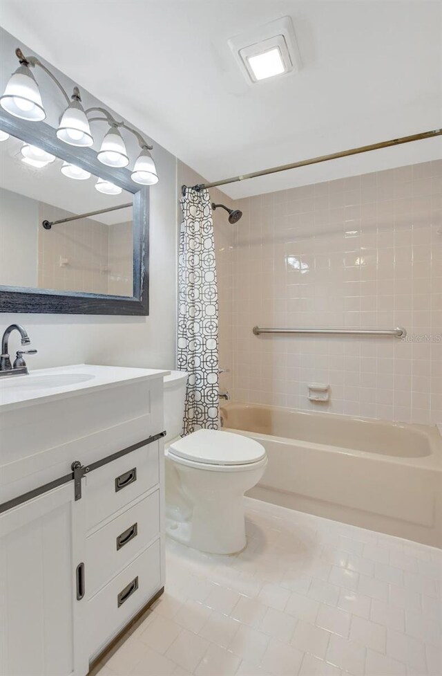 bathroom featuring toilet, shower / bathtub combination with curtain, and vanity