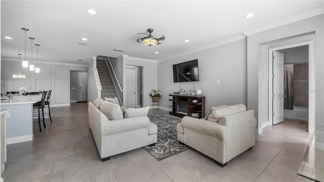 living room with ornamental molding