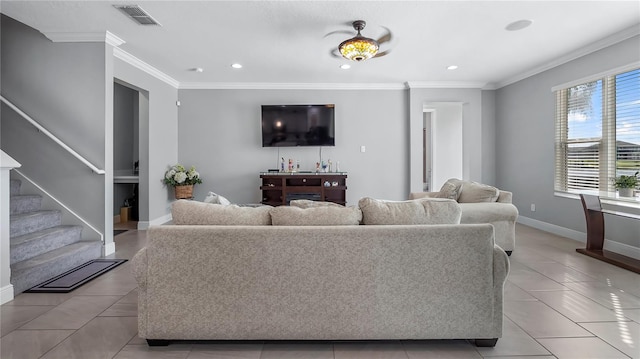 tiled living room with crown molding and ceiling fan