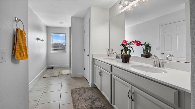 bathroom with vanity and tile patterned floors