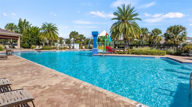 view of swimming pool with a patio