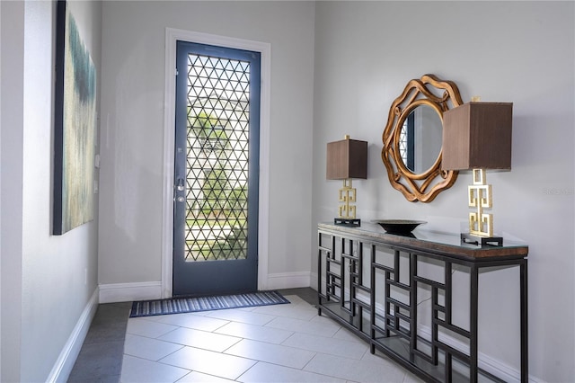 foyer with light tile patterned floors