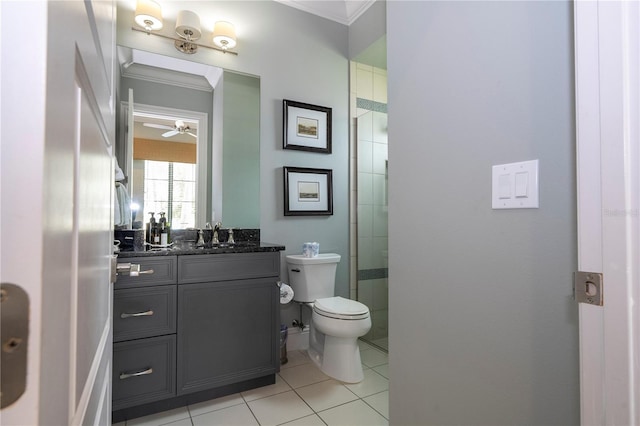 bathroom with vanity, ornamental molding, an enclosed shower, tile patterned floors, and toilet