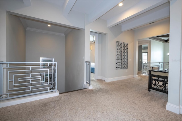 corridor featuring ornamental molding, beamed ceiling, and light colored carpet