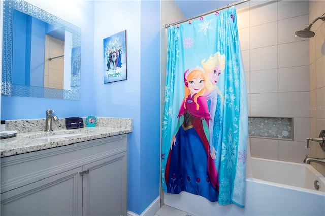 bathroom featuring vanity and shower / tub combo