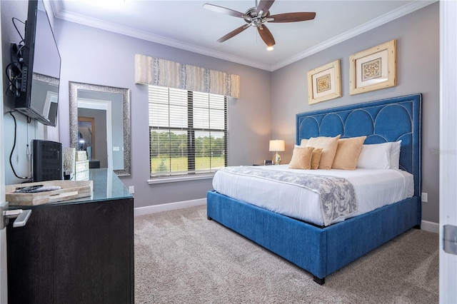 bedroom with ornamental molding, ceiling fan, and carpet floors