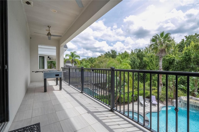 balcony featuring ceiling fan and a patio area