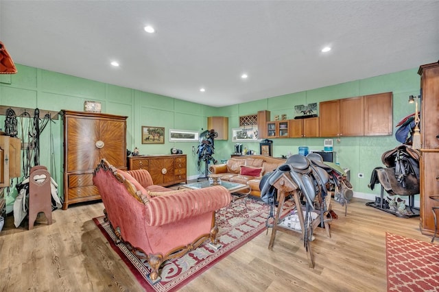 living room with light hardwood / wood-style flooring