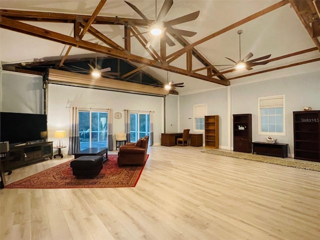 living room with high vaulted ceiling, beamed ceiling, and hardwood / wood-style flooring