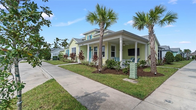 bungalow-style house featuring a front yard and a porch