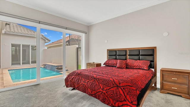 carpeted bedroom featuring crown molding and access to exterior