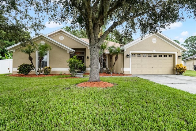 ranch-style house featuring a garage and a front yard