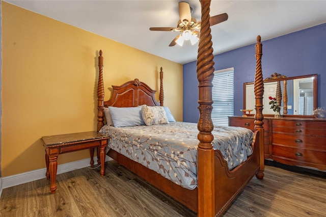 bedroom featuring dark wood-type flooring and ceiling fan