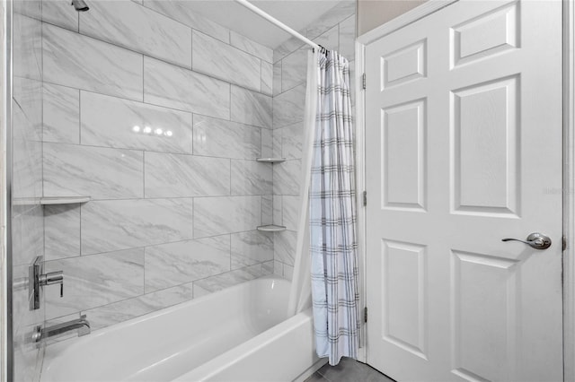 bathroom featuring tile patterned floors and shower / tub combo