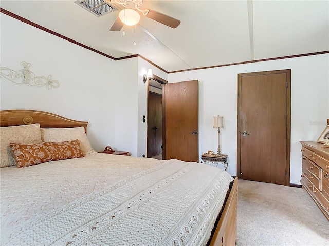 bedroom with light carpet, crown molding, and ceiling fan