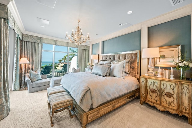 carpeted bedroom featuring ornamental molding, a notable chandelier, and access to exterior