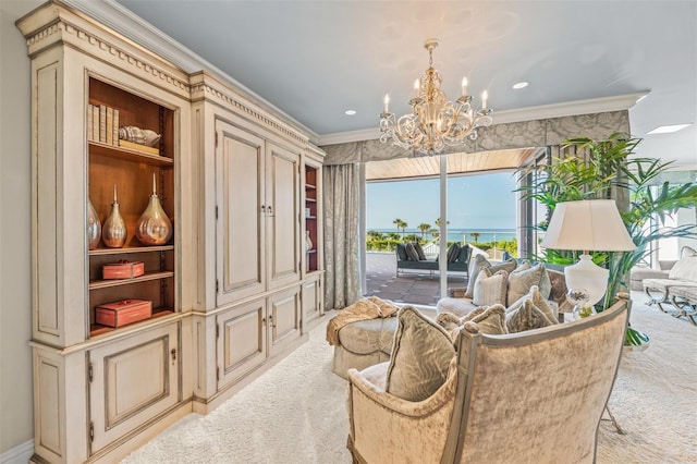 living area featuring a chandelier, light colored carpet, and crown molding