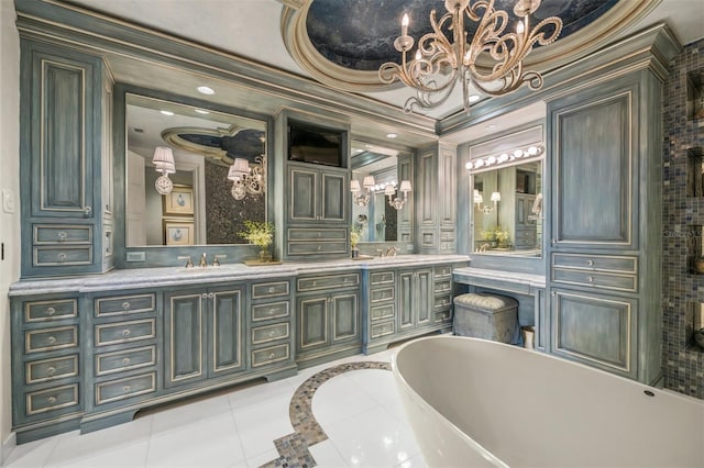 bathroom with vanity, a tub to relax in, crown molding, and tile patterned flooring