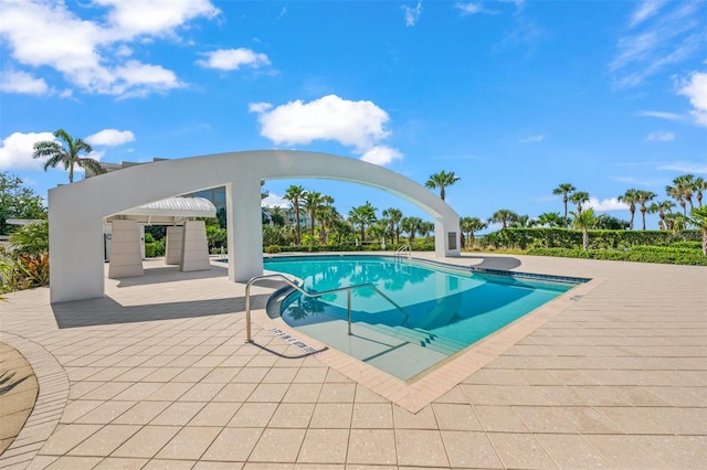 view of pool featuring a patio area