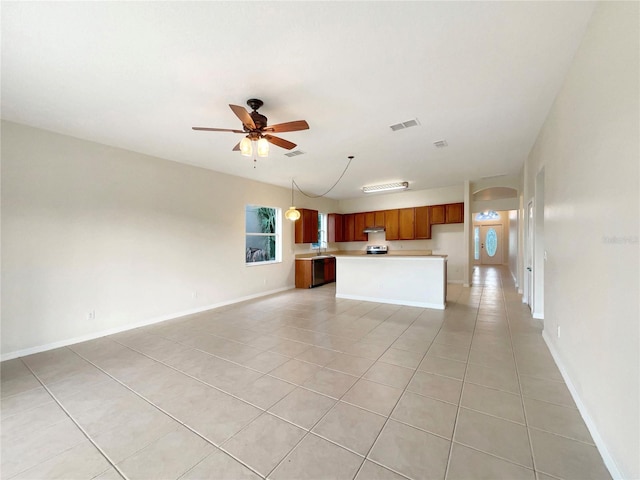 unfurnished living room with light tile patterned flooring and ceiling fan