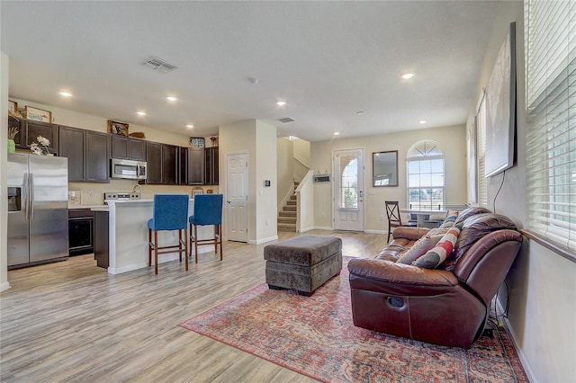 living room featuring light wood-type flooring