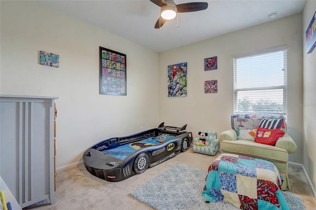 bedroom with ceiling fan and carpet floors