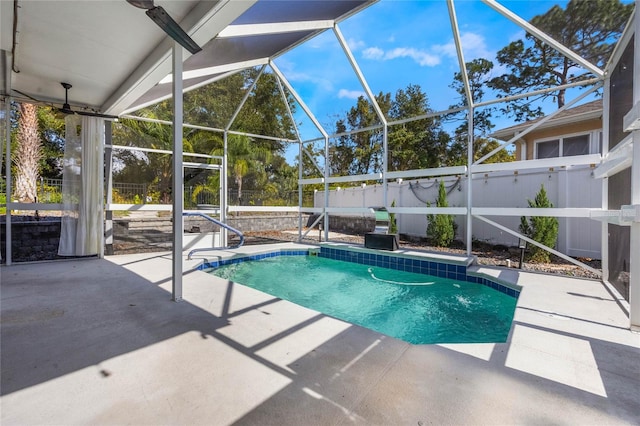 view of pool featuring a patio area and a lanai