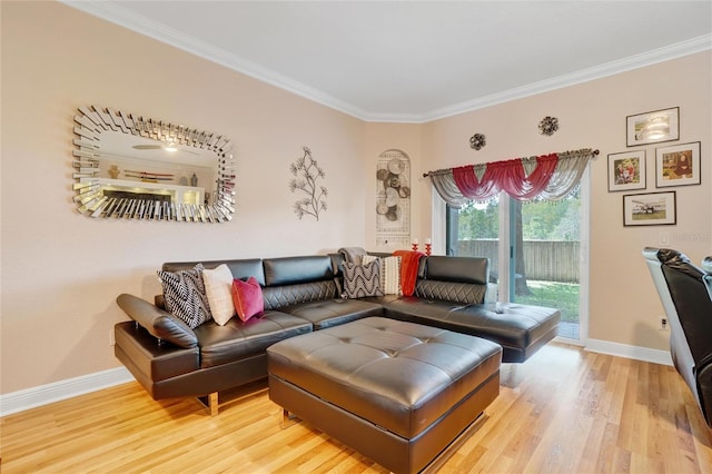 living room with ornamental molding and wood-type flooring