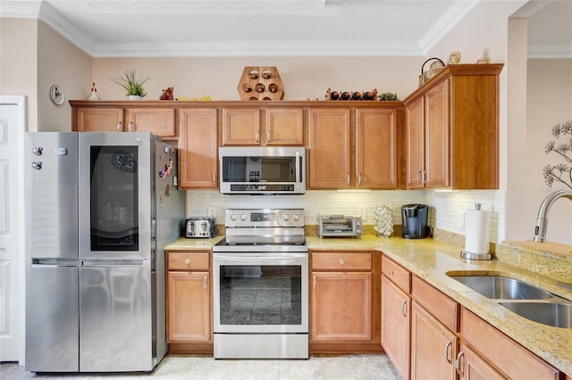 kitchen with ornamental molding, appliances with stainless steel finishes, backsplash, and sink