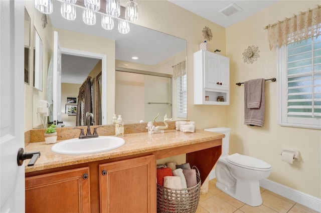 bathroom with walk in shower, tile patterned flooring, vanity, and toilet