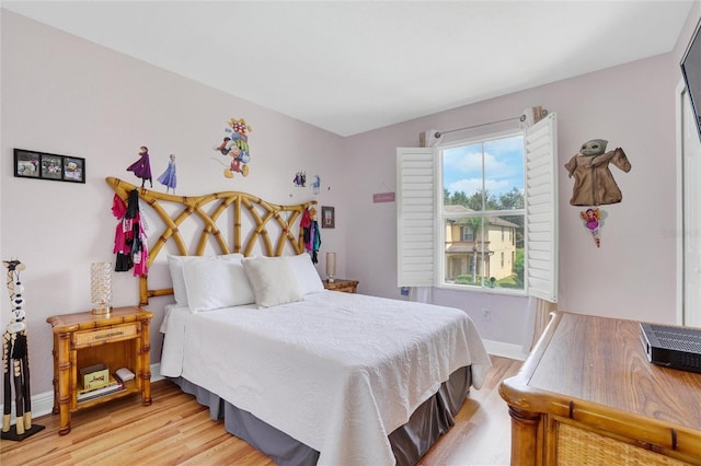 bedroom with light wood-type flooring