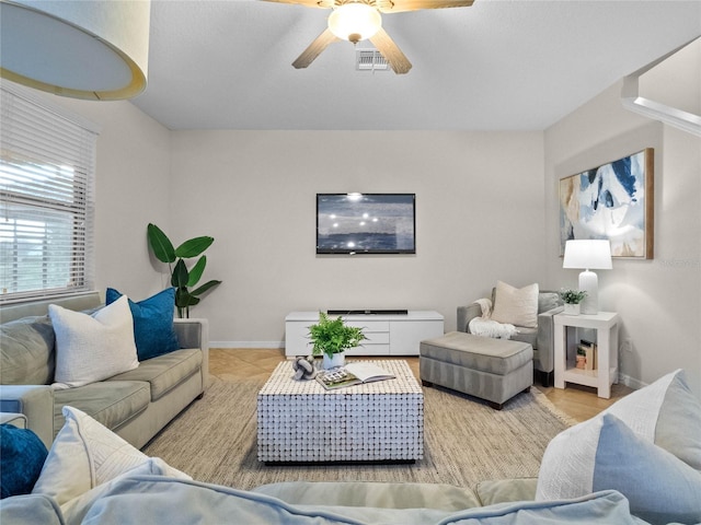 living room with ceiling fan