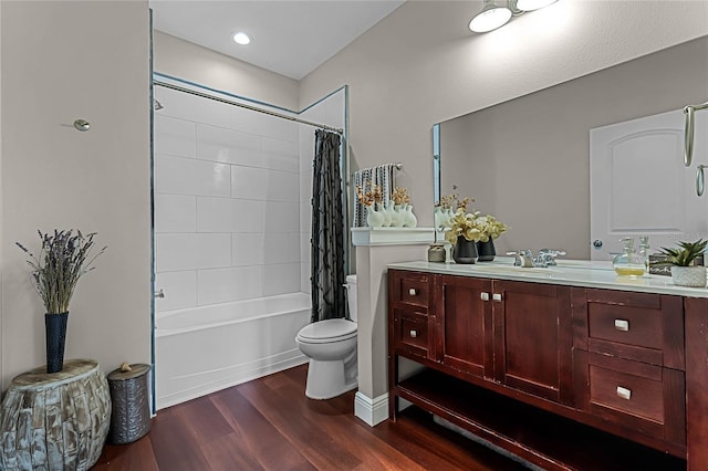 full bathroom with shower / bath combination with curtain, toilet, vanity, and wood-type flooring