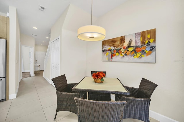 dining room featuring light tile patterned flooring