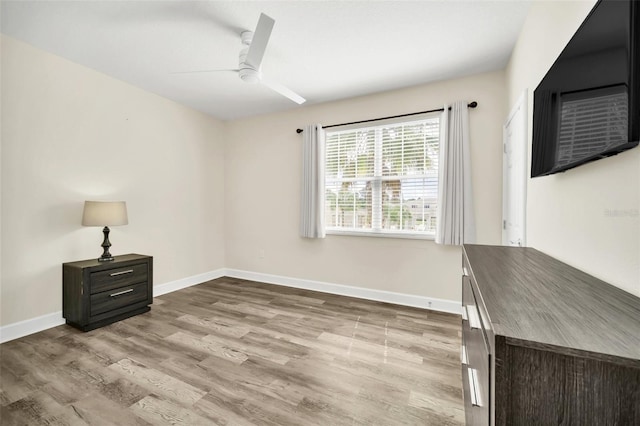 interior space with ceiling fan and light wood-type flooring