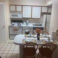 kitchen featuring white appliances